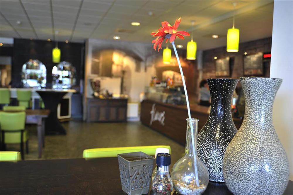 Tulip Inn لايدردورب المطعم الصورة