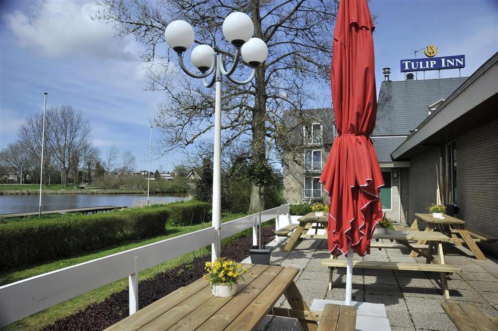Tulip Inn لايدردورب المطعم الصورة