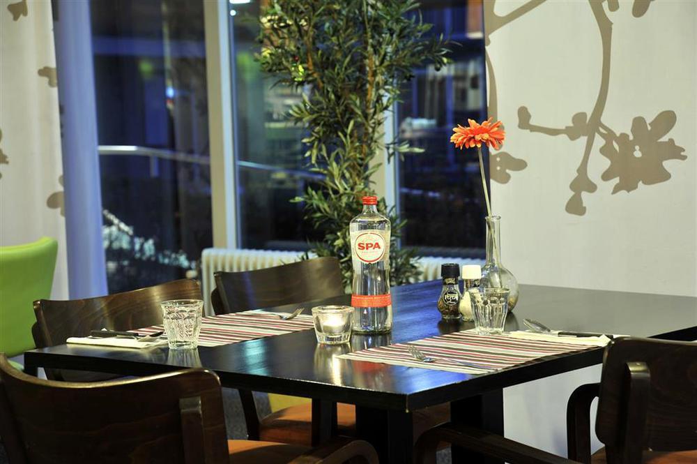 Tulip Inn لايدردورب المطعم الصورة