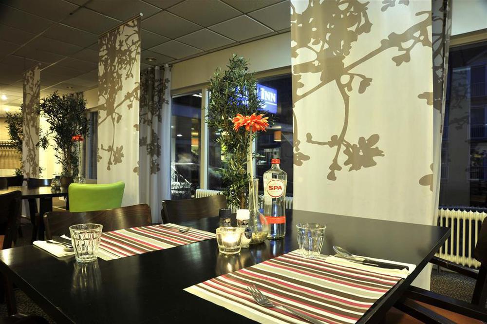 Tulip Inn لايدردورب المطعم الصورة